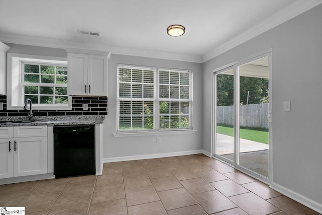 kitchen featuring black dishwasher, sink, light tile patterned flooring, and decorative backsplash