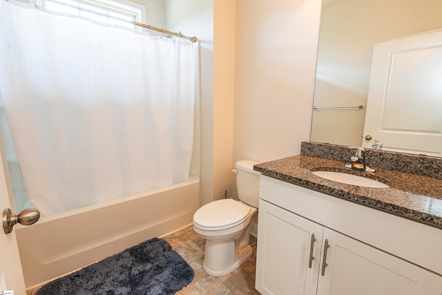 full bathroom with toilet, vanity, and shower / bath combo with shower curtain