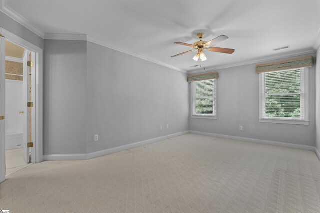 unfurnished room with crown molding and ceiling fan