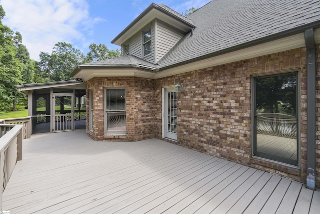 wooden terrace with a sunroom