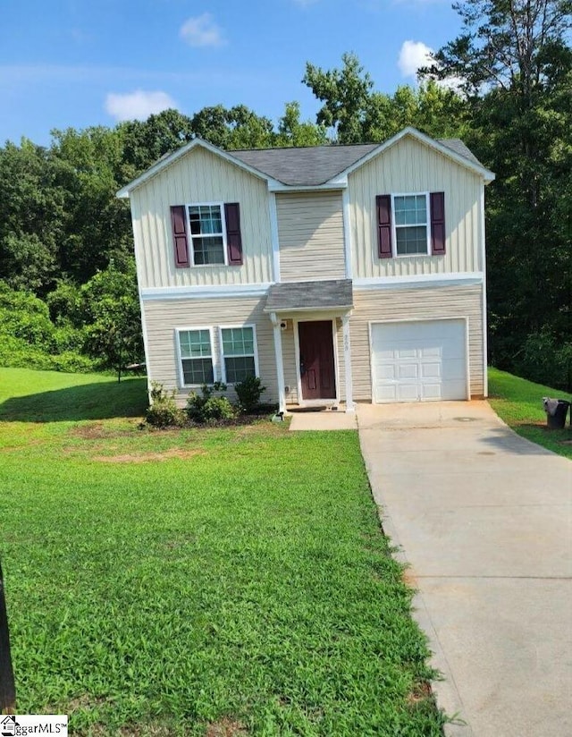 traditional home with an attached garage, concrete driveway, board and batten siding, and a front yard