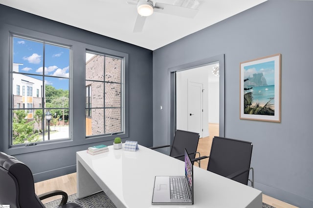 office area featuring ceiling fan and light hardwood / wood-style floors