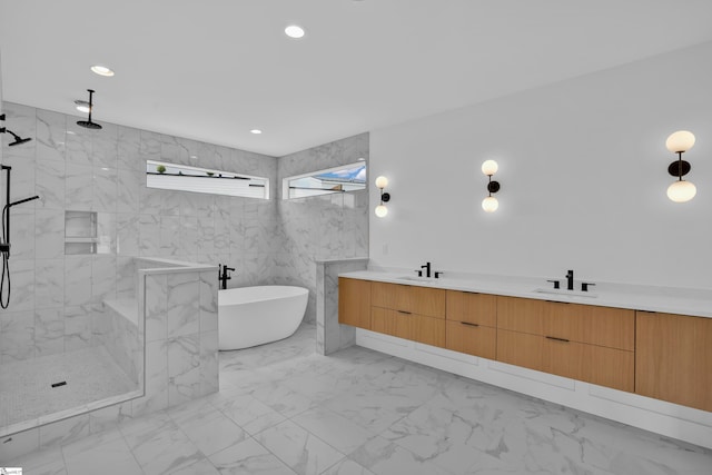 bathroom featuring tile walls, separate shower and tub, dual vanity, and tile patterned floors