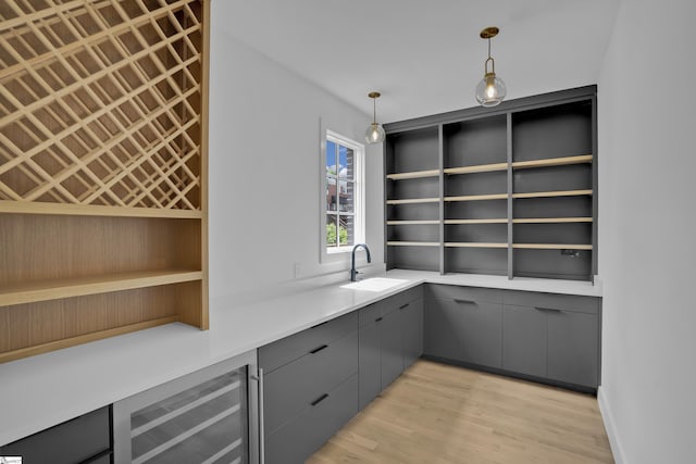 interior space featuring sink and beverage cooler