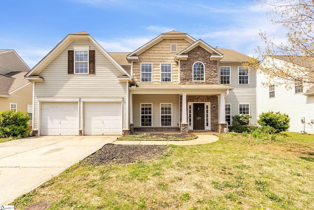 view of front facade with a front lawn and a garage