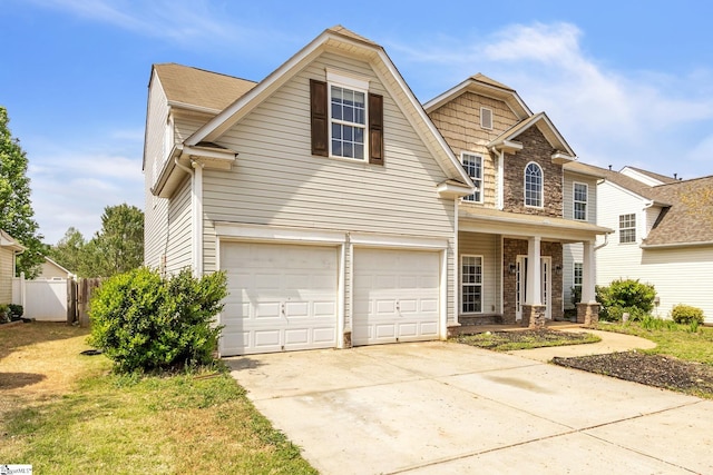 view of front of property with a garage