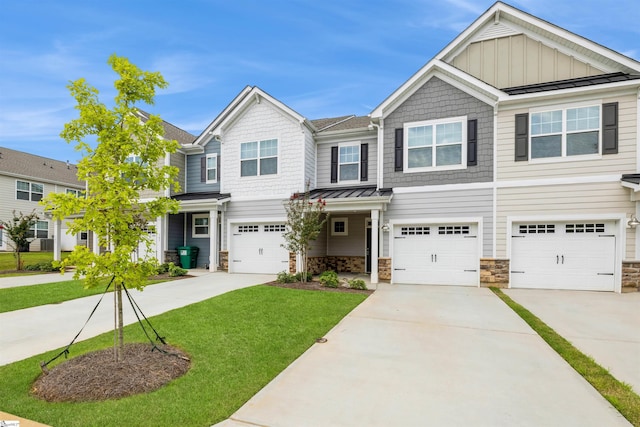 view of front of home with a garage and a front yard