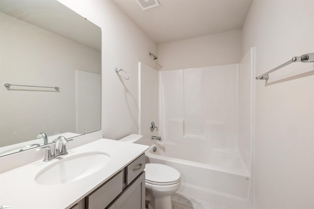 full bathroom with tile patterned floors, bathtub / shower combination, vanity, and toilet