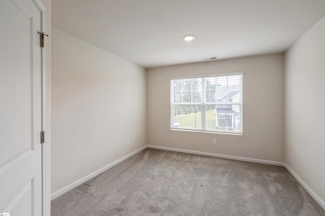 view of carpeted spare room