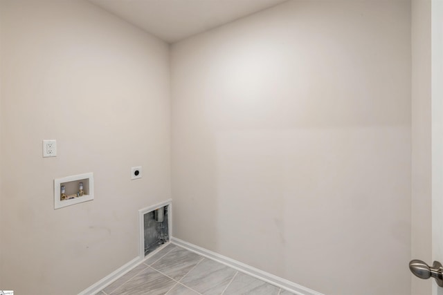 clothes washing area featuring light tile patterned floors, electric dryer hookup, and washer hookup