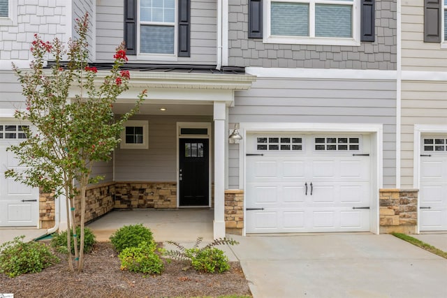 property entrance with a garage