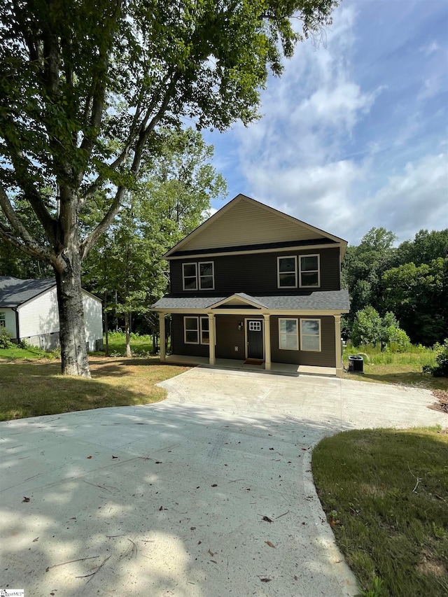 view of front of home with a front yard