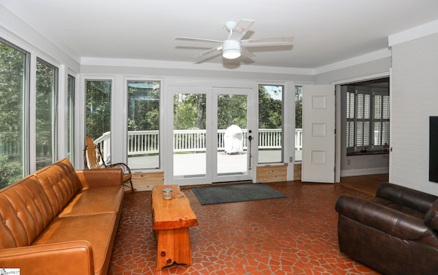 interior space with ceiling fan and a healthy amount of sunlight