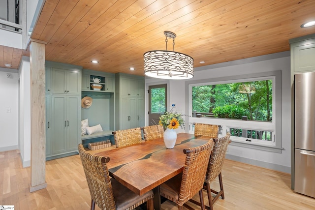 dining space featuring wooden ceiling and light wood-type flooring