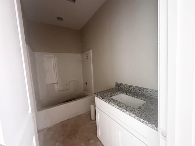 bathroom featuring vanity and tub / shower combination