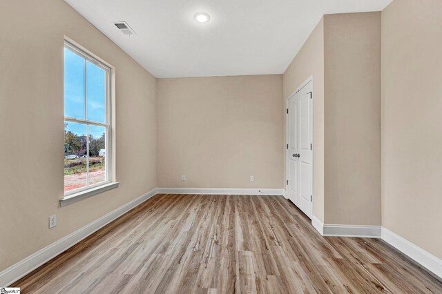 spare room with concrete flooring