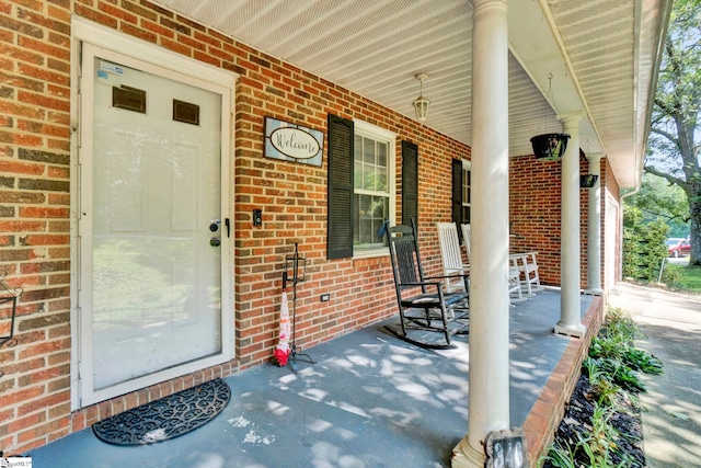 view of patio featuring a porch