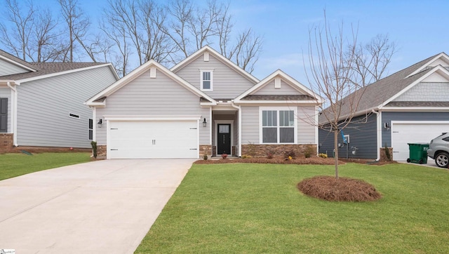 craftsman-style house with driveway, stone siding, a garage, and a front yard