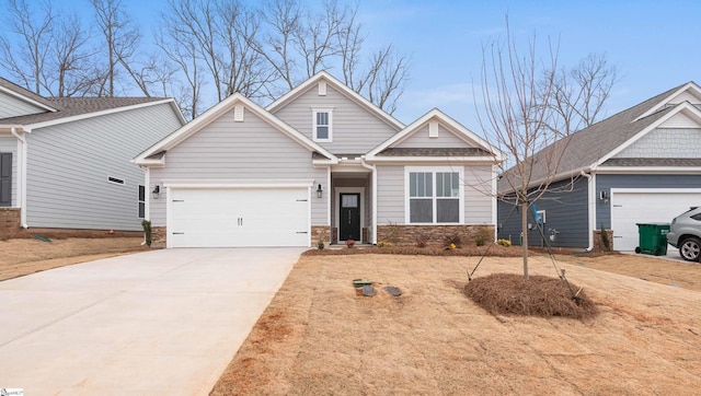 craftsman-style home featuring driveway