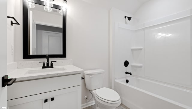 full bath featuring toilet, bathing tub / shower combination, and vanity