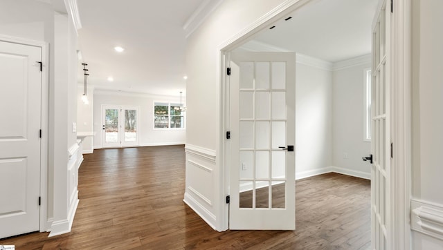 hallway featuring french doors, recessed lighting, dark wood finished floors, and crown molding