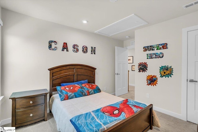 bedroom featuring light carpet