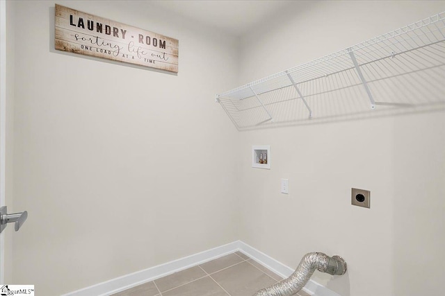 washroom featuring hookup for an electric dryer, tile patterned floors, and hookup for a washing machine