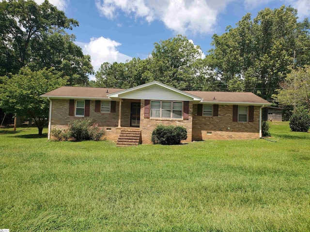 single story home with a front yard