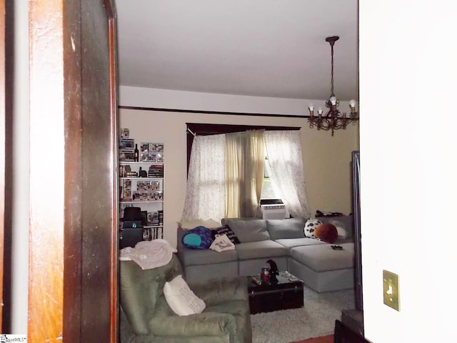 living room featuring a notable chandelier