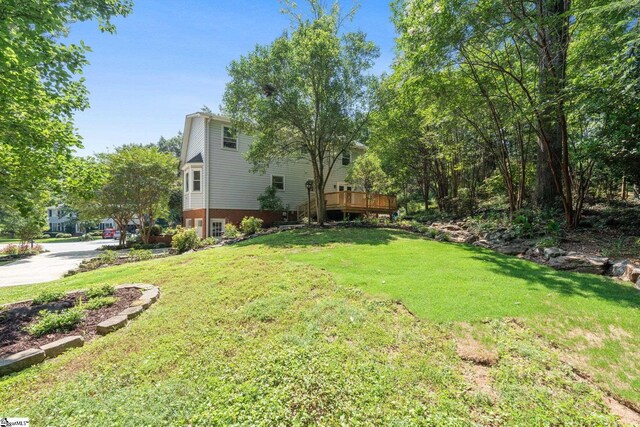 view of yard featuring a deck