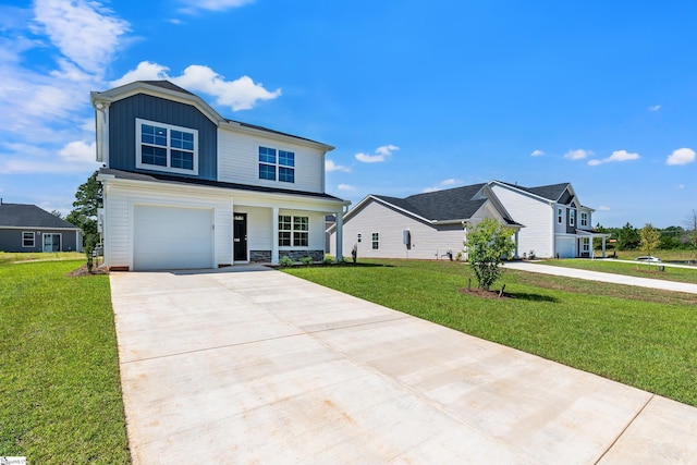 view of property featuring a front lawn, a porch, and a garage