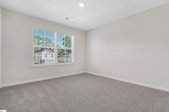 empty room featuring carpet floors