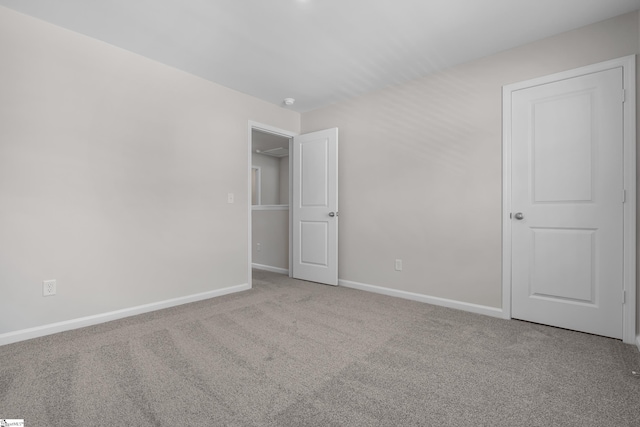 unfurnished bedroom featuring carpet floors