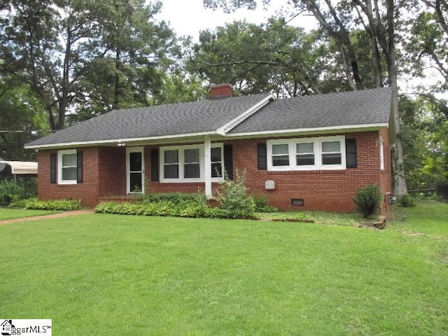 ranch-style home featuring a front yard