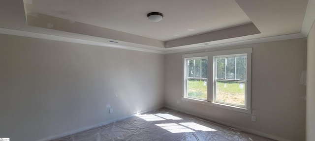 333 Alyssa Landing Dr Unit 72, Fountain Inn, SC 29644 - spare room featuring a tray ceiling and baseboards