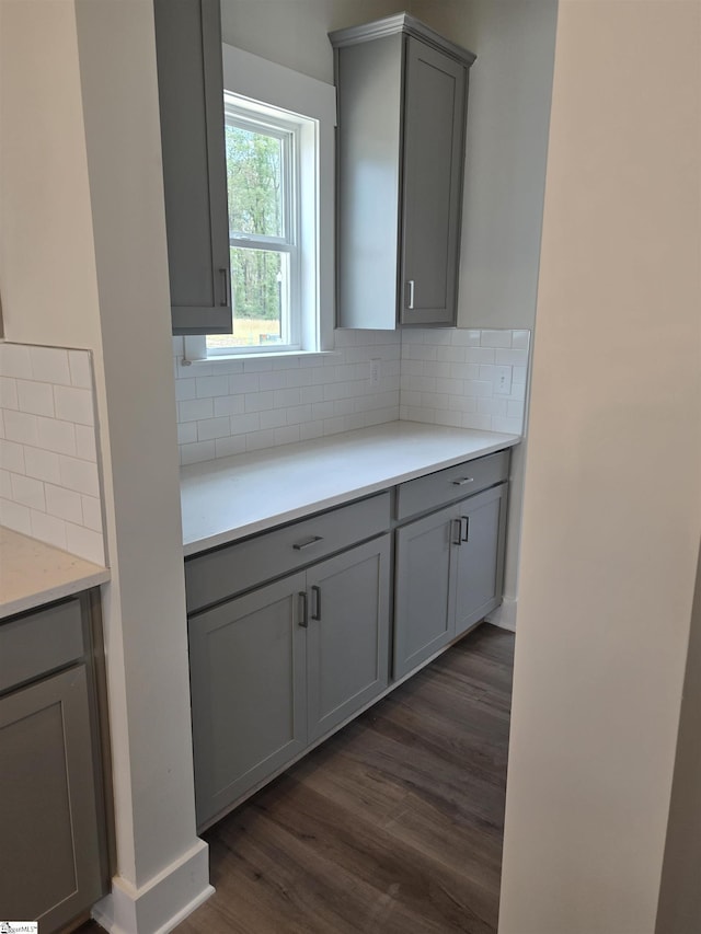 333 Alyssa Landing Dr Unit 72, Fountain Inn, SC 29644 - kitchen with gray cabinetry, dark wood-type flooring, backsplash, and light countertops