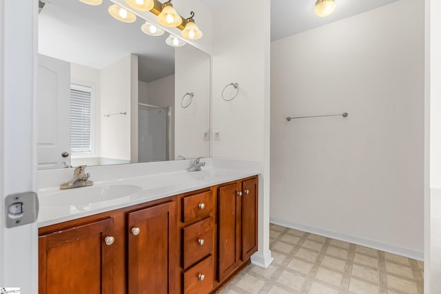 bathroom with tile patterned floors and dual vanity