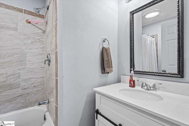 bathroom featuring shower / tub combo with curtain and vanity