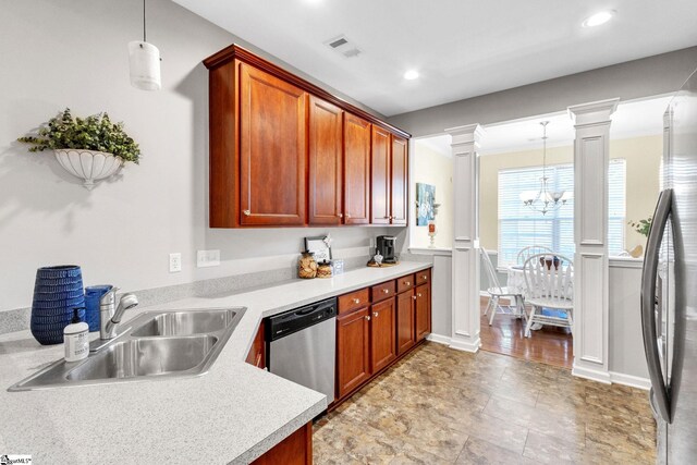 kitchen featuring stainless steel dishwasher, an inviting chandelier, sink, light wood-type flooring, and ornate columns