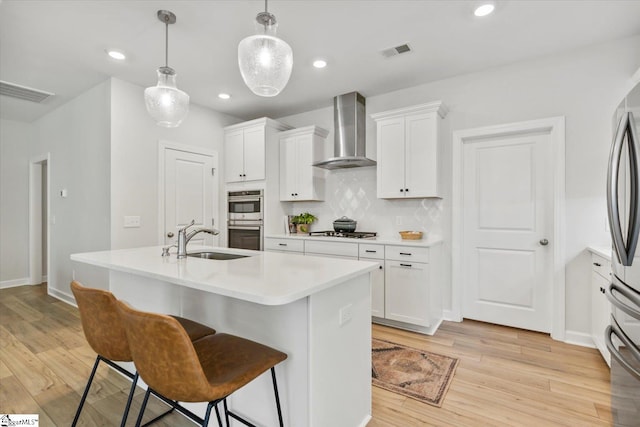 dining space featuring a notable chandelier and light wood-type flooring