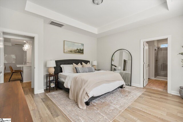 bedroom featuring light wood-type flooring