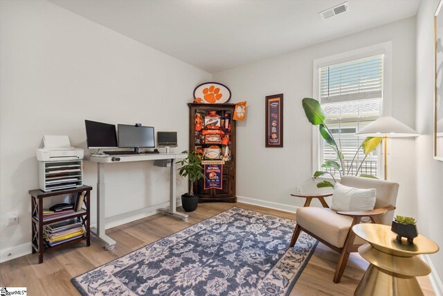 sitting room featuring light wood-type flooring