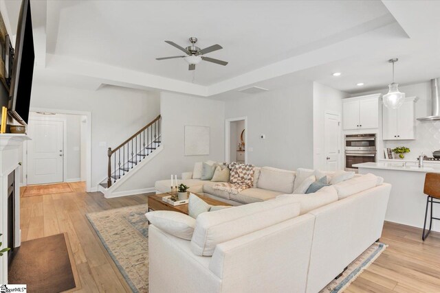 kitchen featuring light hardwood / wood-style flooring, appliances with stainless steel finishes, and a healthy amount of sunlight