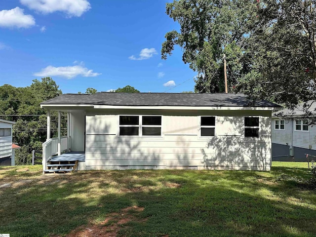 exterior space with a lawn