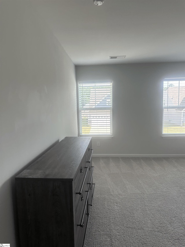 unfurnished bedroom featuring carpet floors