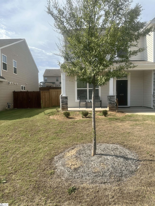 exterior space with a lawn