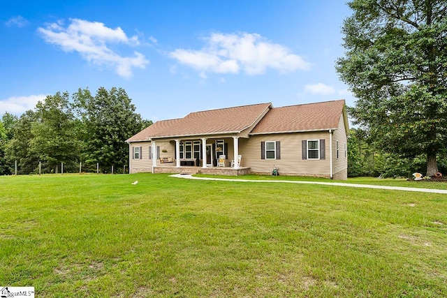 single story home featuring a front yard