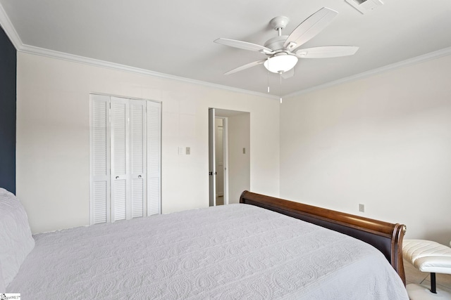 bedroom featuring ceiling fan, a closet, carpet flooring, and ornamental molding