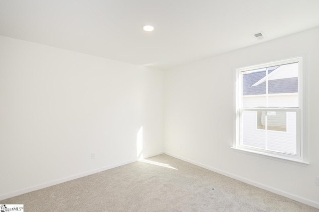 empty room with light carpet