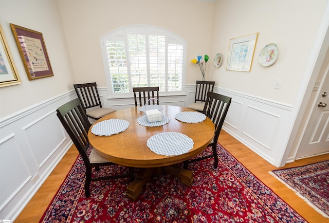 dining area featuring hardwood / wood-style flooring